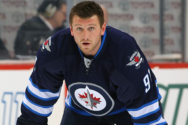 WINNIPEG, CANADA - FEBRUARY 26: Jiri Tlusty #91 of the Winnipeg Jets takes part in the pre-game warm up prior to NHL action against the St. Louis Blues on February 26, 2015 at the MTS Centre in Winnipeg, Manitoba, Canada. This game marks Tlusty's first as a Jet since being traded from the Carolina Hurricanes. (Photo by Jonathan Kozub/NHLI via Getty Images)