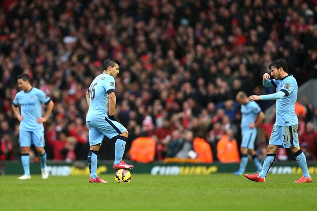 LIVERPOOL, ENGLAND - MARCH 01:  Dejected Manchester City players look on during the Barclays Premier League match between Liverpool and Manchester City at Anfield on March 1, 2015 in Liverpool, England.  (Photo by Clive Brunskill/Getty Images)