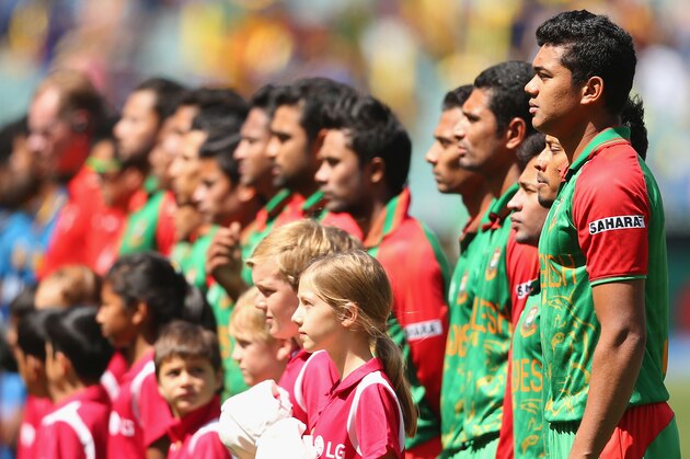 MELBOURNE, AUSTRALIA - FEBRUARY 26:  Bangladesh stand for the national anthem during the 2015 ICC Cricket World Cup match between Sri Lanka and Bangladesh at Melbourne Cricket Ground on February 26, 2015 in Melbourne, Australia.  (Photo by Quinn Rooney/Getty Images)