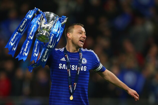 LONDON, ENGLAND - MARCH 01:  Captain John Terry of Chelsea celebrates with the trophy during the Capital One Cup Final match between Chelsea and Tottenham Hotspur at Wembley Stadium on March 1, 2015 in London, England.  (Photo by Clive Rose/Getty Images)
