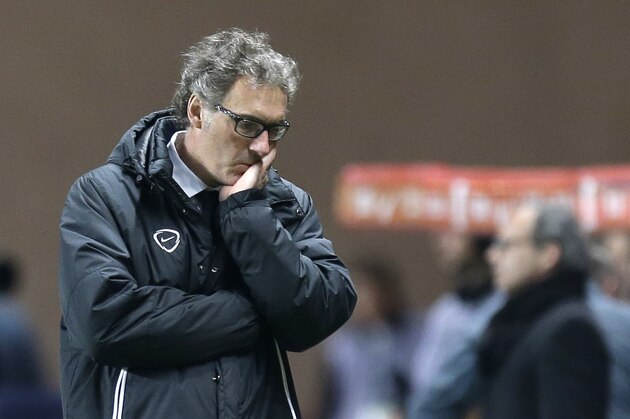 PSG's head coach Laurent Blanc reacts during the French League One soccer match Monaco vs Paris Saint Germain , in Monaco stadium, Sunday, March 1, 2015. (AP Photo/Lionel Cironneau)