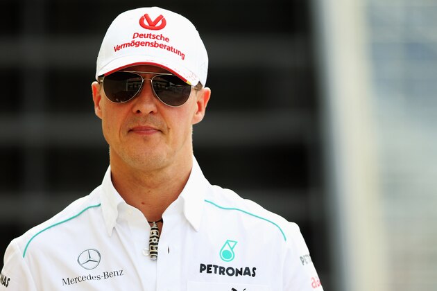 SAO PAULO, BRAZIL - NOVEMBER 23:  Michael Schumacher of Germany and Mercedes GP walks in the paddock following practice for the Brazilian Formula One Grand Prix at the Autodromo Jose Carlos Pace on November 23, 2012 in Sao Paulo, Brazil.  (Photo by Mark Thompson/Getty Images)