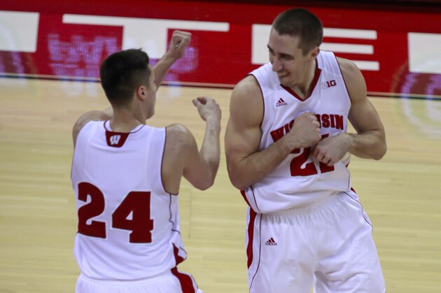 Wisconsin guard Bronson Koenig, left, and guard Josh Gasser celebrate during the first half of an NCAA college basketball game against Iowa Tuesday, Jan. 20, 2015, in Madison, Wis. (AP Photo/Andy Manis)