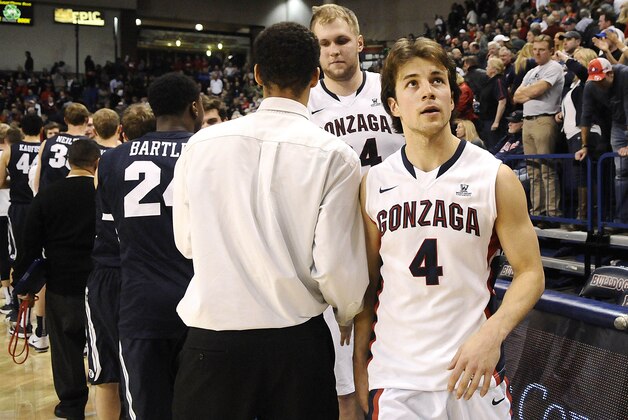 Feb 28, 2015; Spokane, WA, USA; Gonzaga Bulldogs guard Kevin Pangos (4) looks up at the scoreboard after a game against the Brigham Young Cougars at McCarthey Athletic Center. The Cougars won 73-70. Mandatory Credit: James Snook-USA TODAY Sports