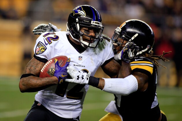 PITTSBURGH, PA - JANUARY 03:  Jacoby Jones #12 of the Baltimore Ravens is tackled by Shamarko Thomas #29 of the Pittsburgh Steelers during their AFC Wild Card game at Heinz Field on January 3, 2015 in Pittsburgh, Pennsylvania.  (Photo by Justin K. Aller/Getty Images)
