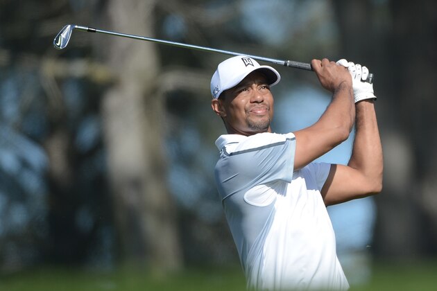 LA JOLLA, CA - FEBRUARY 05:  Tiger Woods plays his tee shot on the 17th hole of the north course during the first round of the Farmers Insurance Open at Torrey Pines Golf Course on February 5, 2015 in La Jolla, California.  (Photo by Donald Miralle/Getty Images)