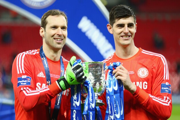 LONDON, ENGLAND - MARCH 01:  Petr Cech and Thibaut Courtois of Chelsea pose with the trophy during the Capital One Cup Final match between Chelsea and Tottenham Hotspur at Wembley Stadium on March 1, 2015 in London, England.  (Photo by Clive Mason/Getty Images)