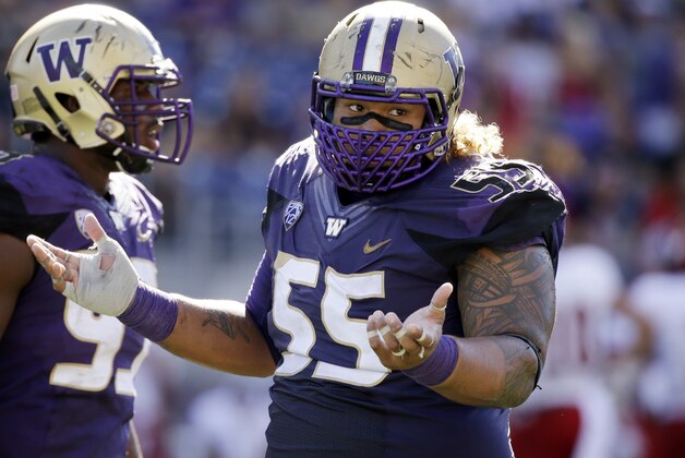 Washington Huskies defensive lineman Danny Shelton in action against Eastern Washington in an NCAA football game Saturday, Sept. 6, 2014, in Seattle. Washington won 59-52. (AP Photo/Elaine Thompson)
