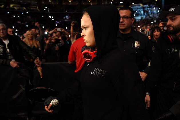 LOS ANGELES, CA - FEBRUARY 28:  Ronda Rousey enters the arena in her UFC women's bantamweight championship bout against Cat Zingano during the UFC 184 event at Staples Center on February 28, 2015 in Los Angeles, California.  (Photo by Harry How/Getty Images)