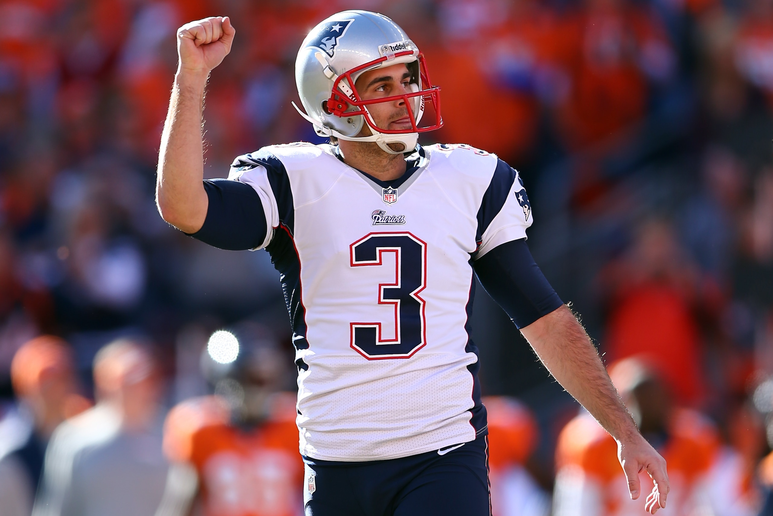 DENVER, CO - JANUARY 19:  Stephen Gostkowski #3 of the New England Patriots celebrates his second quarter field goal against the Denver Broncos during the AFC Championship game at Sports Authority Field at Mile High on January 19, 2014 in Denver, Colorado.  (Photo by Elsa/Getty Images)