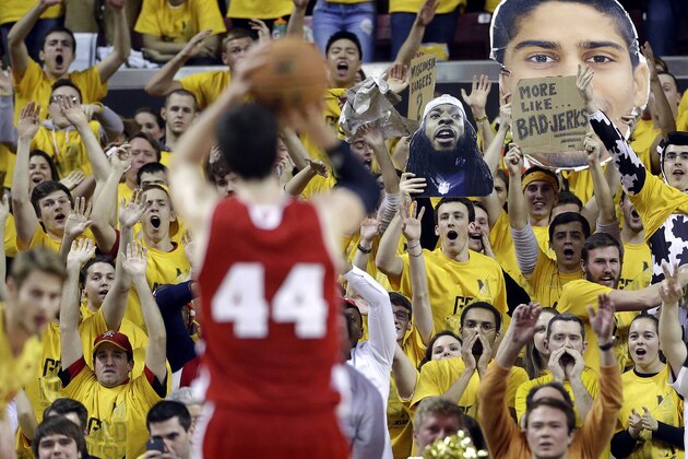 Maryland fans try to distract Wisconsin forward Frank Kaminsky (44) as he shoots a free throw in the second half of an NCAA college basketball game against Maryland, Tuesday, Feb. 24, 2015, in College Park, Md. (AP Photo/Patrick Semansky)