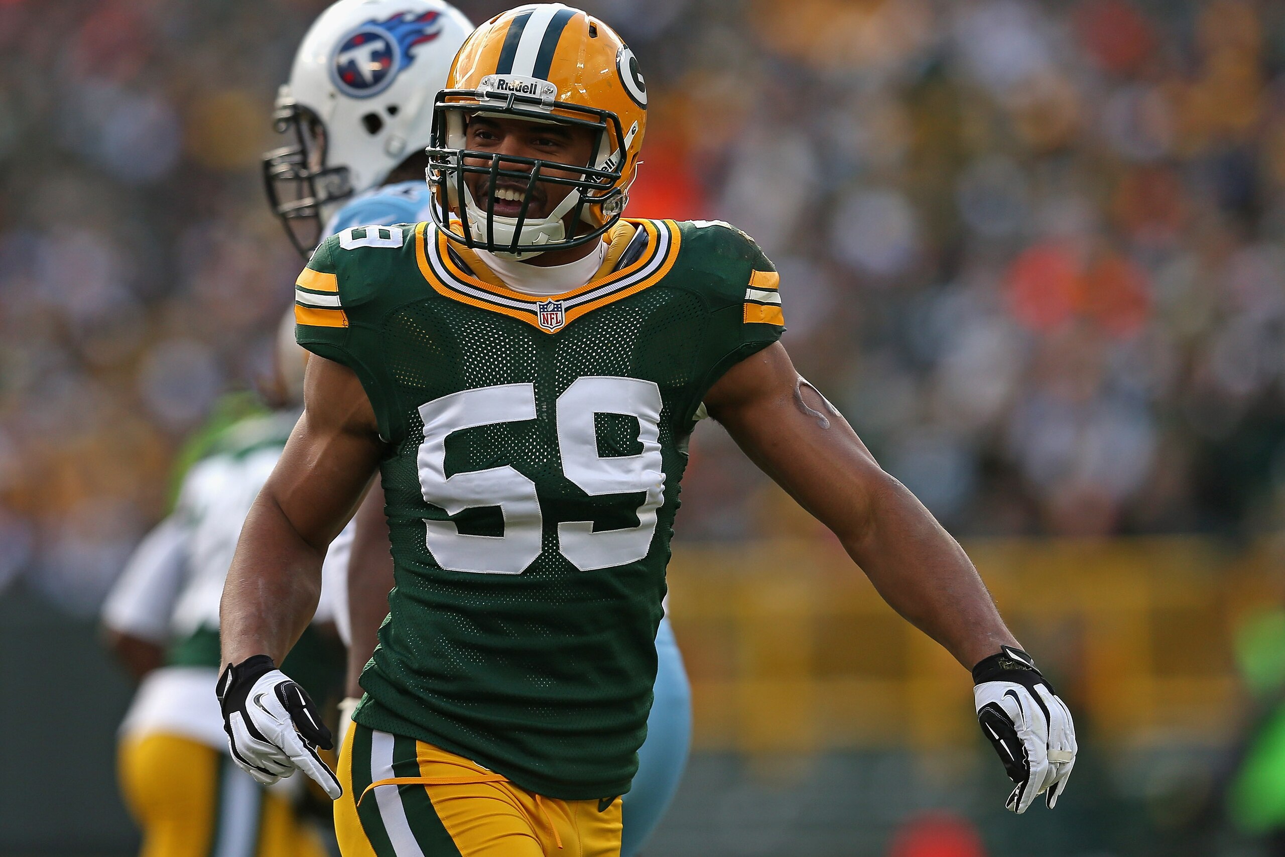 GREEN BAY, WI - DECEMBER 23: Brad Jones #59 of the Green Bay Packers celebrates a play against the Tennessee Titans at Lambeau Field on December 23, 2012 in Green Bay, Wisconsin. The Packers defeated the Titans 55-7. (Photo by Jonathan Daniel/Getty Images) GREEN BAY, WI - DECEMBER 23: Brad Jones #59 of the Green Bay Packers celebrates a play against the Tennessee Titans at Lambeau Field on December 23, 2012 in Green Bay, Wisconsin. The Packers defeated the Titans 55-7. (Photo by Jonathan Daniel/Getty Images)