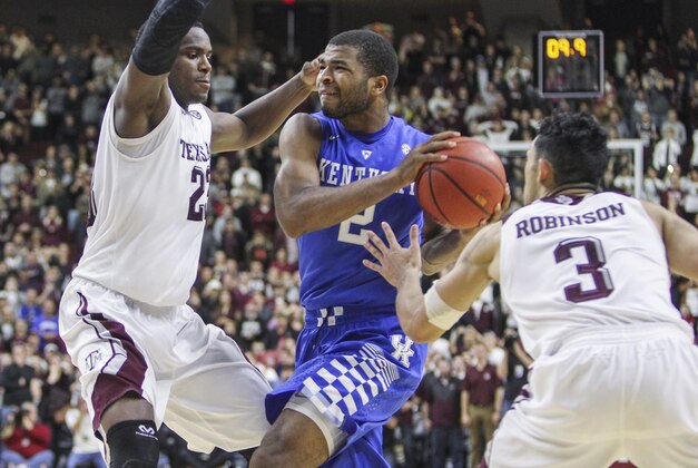 Jan 10, 2015; College Station, TX, USA; Kentucky Wildcats guard Aaron Harrison (2) drives to the basket during overtime against the Texas A&M Aggies at Reed Arena. The Wildcats defeated the Aggies 70-64 in double overtime. Mandatory Credit: Troy Taormina-USA TODAY Sports