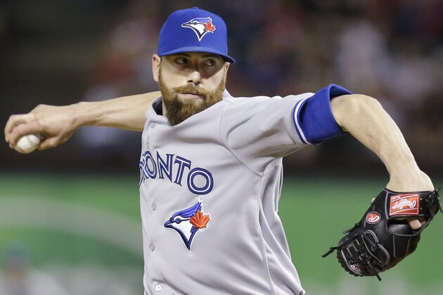 Toronto Blue Jays relief pitcher Steve Delabar throws during the eighth inning of a baseball game against the Texas Rangers in Arlington, Texas, Saturday, May 17, 2014. Delabar retired four straight, including striking out to earn the victory in the 4-2 Blue Jays win. (AP Photo/LM Otero)