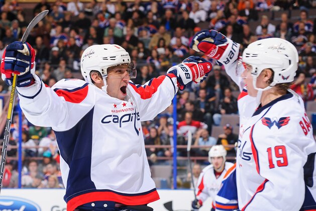 EDMONTON, AB - OCTOBER 24:  Alex Ovechkin #8 of the Washington Capitals celebrates with Nicklas Backstrom #19 after Nicklas scored the team's third goal against the Edmonton Oilers during an NHL game at Rexall Place on October 24, 2013 in Edmonton, Alberta, Canada. The Capitals defeated the Oilers 4-1. (Photo by Derek Leung/Getty Images)