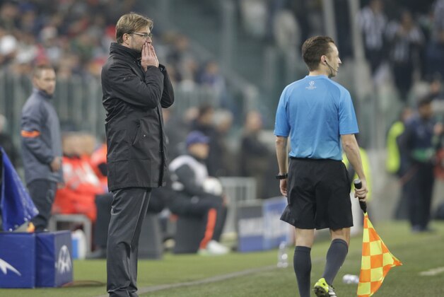 Dortmund's head coach Juergen Klopp watches the Champions League round of 16 first leg soccer match between Juventus and Borussia Dortmund at the Juventus stadium in Turin, Italy, Tuesday, Feb. 24, 2015. (AP Photo/Antonio Calanni)