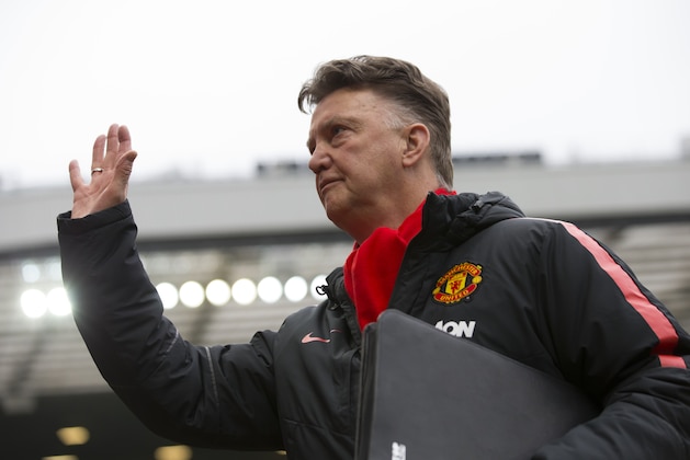 Manchester United's manager Louis van Gaal waves as he takes to the touchline before his team's English Premier League soccer match between Manchester United and Sunderland at Old Trafford Stadium, Manchester, England, Saturday Feb. 28, 2015. (AP Photo/Jon Super)