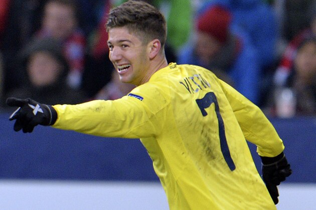 Villareal's Luciano Vietto celebrates after scoring during the Europa League Round 32 soccer match between FC Salzburg and Villareal FC in the Arena in Salzburg, Austria, Thursday, Feb. 26, 2015. (AP Photo/Kerstin Joensson)