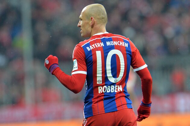 Bayern's Arjen Robben from the Netherlands celebrates after scoring during the soccer match between FC Bayern Munich and 1. FC Cologne in the Allianz Arena in Munich, Germany, Friday, Feb. 27, 2015. (AP Photo/Kerstin Joensson)