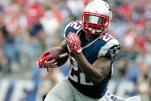 Sep 21, 2014; Foxborough, MA, USA; New England Patriots running back Stevan Ridley (22) runs against the Oakland Raiders during the second half at Gillette Stadium. Mandatory Credit: Winslow Townson-USA TODAY Sports