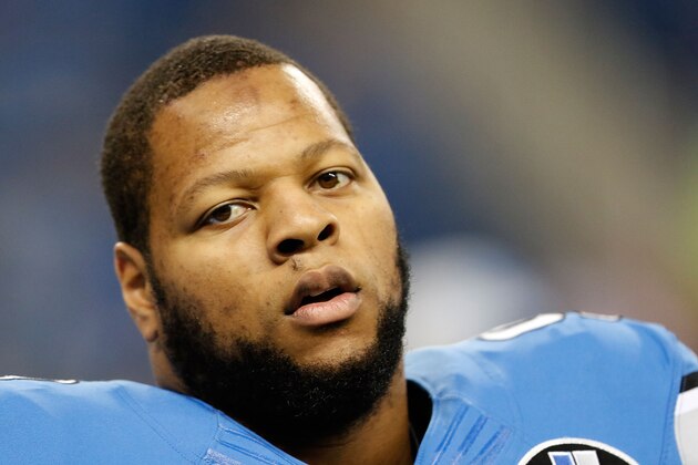 DETROIT, MI - DECEMBER 07:  Ndamukong Suh #90 of the Detroit Lions looks to the sidelines during the pre-game warm up prior to the start of the game against the Tampa Bay Buccaneers at Ford Field on December 7, 2014 in Detroit, Michigan. The Lions defeated the Buccaneers 34-17.  (Photo by Leon Halip/Getty Images)