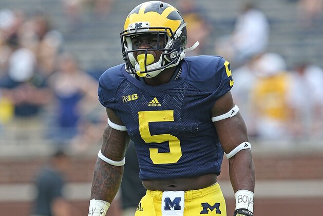 ANN ARBOR, MI - AUGUST 30:  Jabrill Peppers #5 of the Michigan Wolverines warms up prior to the start of the game against the Appalachian State Mountaineers on August 30, 2014 in Ann Arbor, Michigan. The Wolverines defeated the Mountaineers 52-14.  (Photo by Leon Halip/Getty Images)