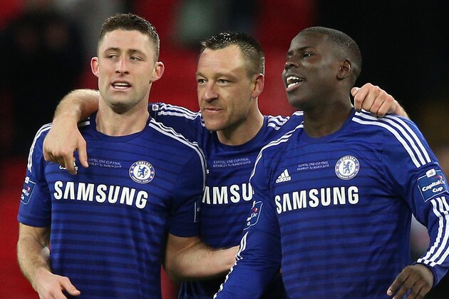 LONDON, ENGLAND - MARCH 01:  (L-R) Gary Cahill, John Terry and Kurt Zouma of Chelsea celebrate after victory in the Capital One Cup Final match between Chelsea and Tottenham Hotspur at Wembley Stadium on March 1, 2015 in London, England.  (Photo by Clive Mason/Getty Images)