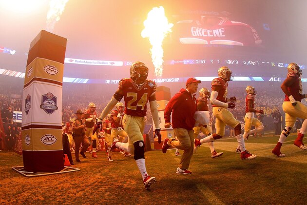CHARLOTTE, NC - DECEMBER 06:  Head coach Jimbo Fisher and his Florida State Seminoles take the field against the Georgia Tech Yellow Jackets for the ACC Championship game on December 6, 2014 in Charlotte, North Carolina.  (Photo by Mike Ehrmann/Getty Images)