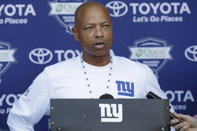 New York Giants general manager Jerry Reese speaks to reporters during a NFL football camp in East Rutherford, N.J., Wednesday, July 23, 2014. (AP Photo/seth wenig)