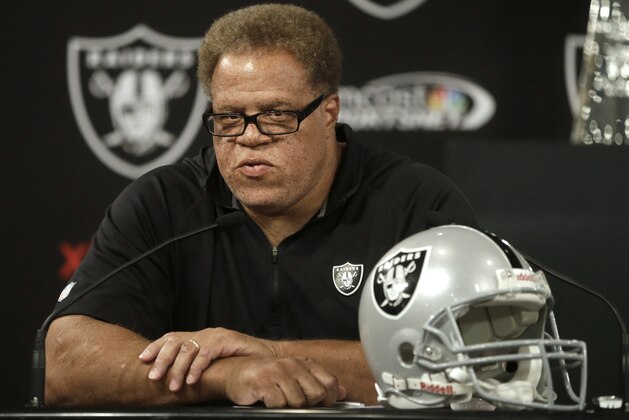 Oakland Raiders general manager Reggie McKenzie answers questions from reporters during a news conference Tuesday, Sept. 30, 2014, in Alameda, Calif. The Oakland Raiders named Tony Sparano as interim coach of the NFL football team, a day after the firing of coach Dennis Allen. (AP Photo/Ben Margot)