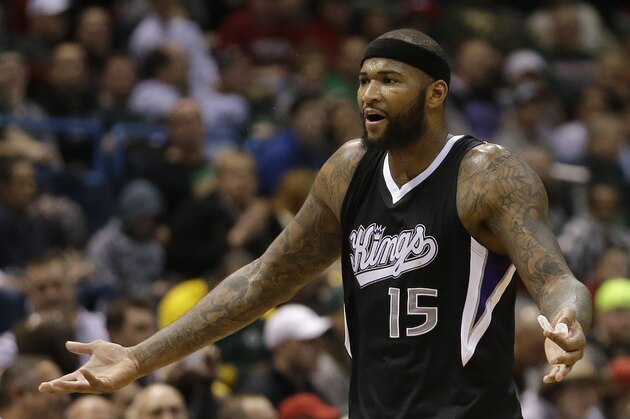 Sacramento Kings' DeMarcus Cousins reacts as he walks to the bench during an NBA basketball game against the Sacramento Kings Wednesday, Feb. 11, 2015, in Milwaukee. (AP Photo/Aaron Gash)