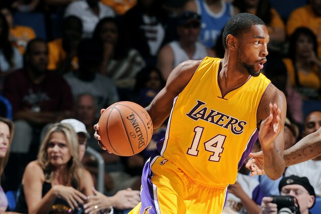 ONTARIO, CA - OCTOBER 12:  Roscoe Smith #14 of the Los Angeles Lakers handles the ball during the game against the Golden State Warriors on October 12, 2014 at Citizens Business Bank Arena in Ontario, California. NOTE TO USER: User expressly acknowledges and agrees that, by downloading and/or using this Photograph, user is consenting to the terms and conditions of the Getty Images License Agreement. Mandatory Copyright Notice: Copyright 2014 NBAE (Photo by Noah Graham/NBAE via Getty Images)
