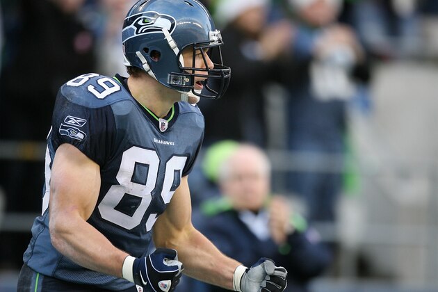SEATTLE - DECEMBER 20:  Tight end John Carlson #89 of the Seattle Seahawks celebrates after scoring a touchdown against the Tampa Bay Buccaneers on December 20, 2009 at Qwest Field in Seattle, Washington. (Photo by Otto Greule Jr/Getty Images)