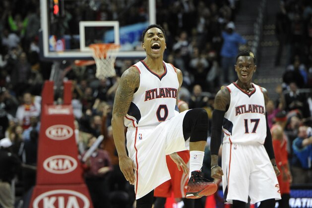 Atlanta Hawks guard Jeff Teague (0) reacts after making a go-ahead jumper late in an NBA basketball game against the Houston Rockets, Tuesday, March 3, 2015, in Atlanta. Atlanta won 104-96. (AP Photo/John Amis)