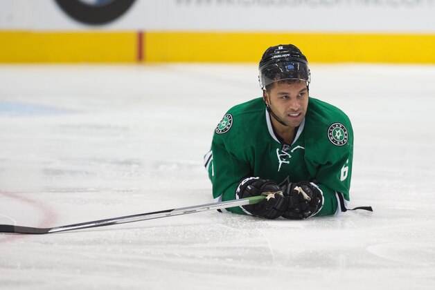 Mar 3, 2015; Dallas, TX, USA; Dallas Stars defenseman Trevor Daley (6) lies on the ice after being hit by New York Islanders left wing Matt Martin (not pictured) during the first period at the American Airlines Center. Mandatory Credit: Jerome Miron-USA TODAY Sports