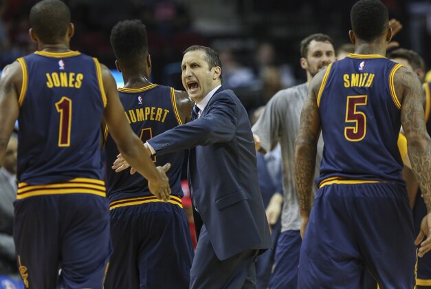 Mar 1, 2015; Houston, TX, USA; Cleveland Cavaliers head coach David Blatt congratulates forward James Jones (1) after a play during the second quarter against the Houston Rockets at Toyota Center. Mandatory Credit: Troy Taormina-USA TODAY Sports