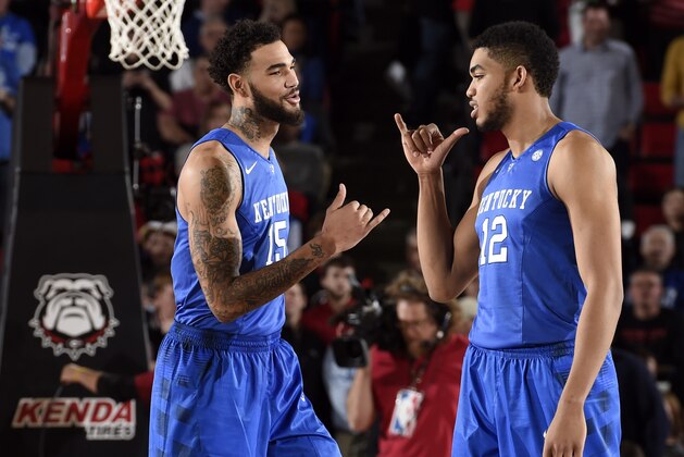 Mar 3, 2015; Athens, GA, USA; Kentucky Wildcats forward Karl-Anthony Towns (12) reacts with forward Willie Cauley-Stein (15) against the Georgia Bulldogs  at Stegeman Coliseum. Kentucky defeated Georgia 72-64. Mandatory Credit: Dale Zanine-USA TODAY Sports
