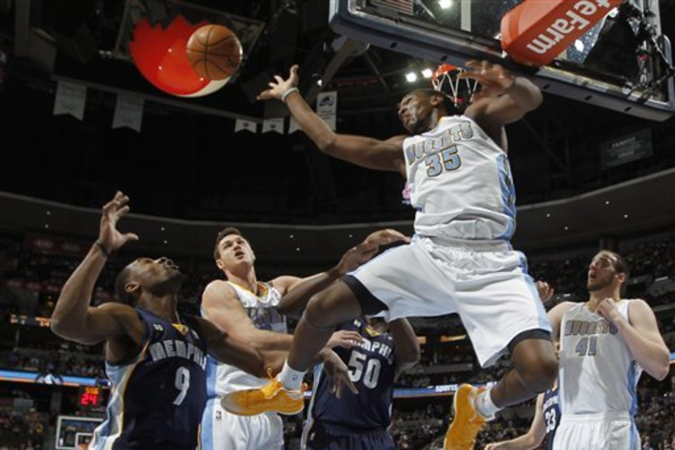 Denver Nuggets forward Kenneth Faried, front, reaches out to block a shot from Memphis Grizzlies guard Tony Allen, back left, as Nuggets forward Danilo Gallinari, second from left, of Italy, Grizzlies forward Zach Randolph, third from left, and Nuggets forward Kosta Koufos look on in the first quarter of an NBA basketball game in Denver, Friday, March 15, 2013. (AP Photo/David Zalubowski) Denver Nuggets forward Kenneth Faried, front, reaches out to block a shot from Memphis Grizzlies guard Tony Allen, back left, as Nuggets forward Danilo Gallinari, second from left, of Italy, Grizzlies forward Zach Randolph, third from left, and Nuggets forward Kosta Koufos look on in the first quarter of an NBA basketball game in Denver, Friday, March 15, 2013. (AP Photo/David Zalubowski)