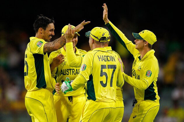 PERTH, AUSTRALIA - MARCH 04: Australia celebrates after taking the wicket of Nawroz Mangal of Afghanistan  during the 2015 ICC Cricket World Cup match between Australia and Afghanistan at WACA on March 4, 2015 in Perth, Australia.  (Photo by Will Russell/Getty Images)