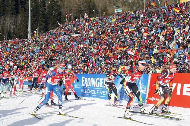 Competitors start during a women's Biathlon 4x6 kilometer relay race in Anterselva, Italy, Sunday, Jan. 25, 2015. (AP Photo/Felice Calabro')
