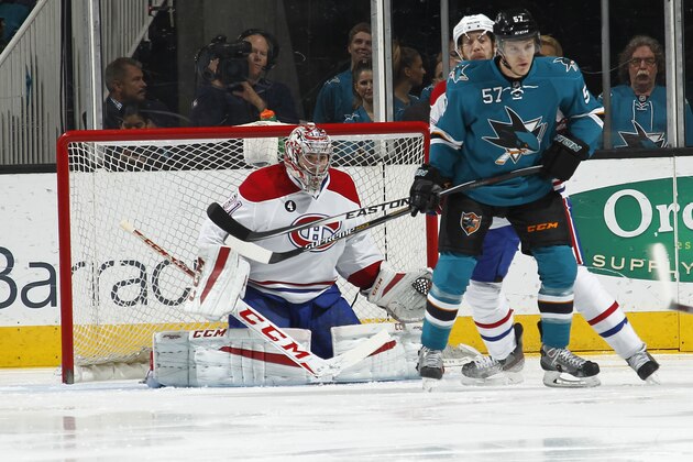 SAN JOSE, CA - MARCH 2:  Tommy Wingels #57 of the San Jose Sharks battles for position in front of the net against goalie  Carey Price #31 of the Montreal Canadiens at the SAP Center on March 2, 2015 in San Jose, CA . (Photo by Don Smith/NHLI via Getty Images) Tommy Wingels;Carey Price