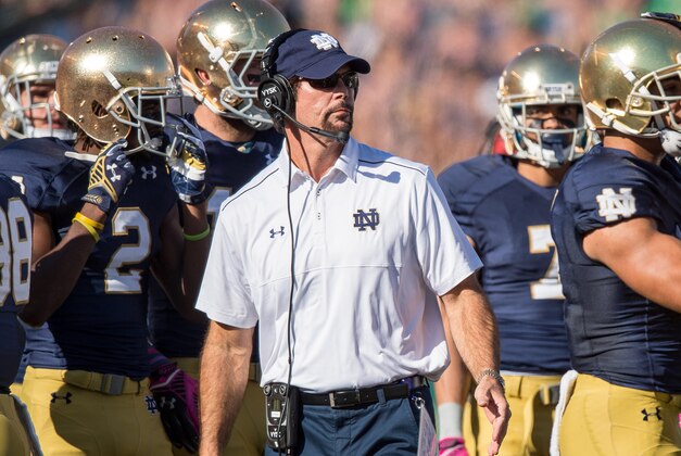 Oct 11, 2014; South Bend, IN, USA; Notre Dame Fighting Irish defensive coordinator Brian VanGorder watches from the sideline in the first quarter against the North Carolina Tar Heels at Notre Dame Stadium. Notre Dame won 50-43. Mandatory Credit: Matt Cashore-USA TODAY Sports