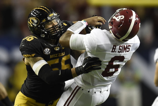Dec 6, 2014; Atlanta, GA, USA; Missouri Tigers defensive lineman Shane Ray (56) tackles Alabama Crimson Tide quarterback Blake Sims (6) during the second quarter of the 2014 SEC Championship Game at the Georgia Dome. The play caused Ray to be ejected from the game for targeting. Mandatory Credit: Dale Zanine-USA TODAY Sports Dec 6, 2014; Atlanta, GA, USA; Missouri Tigers defensive lineman Shane Ray (56) tackles Alabama Crimson Tide quarterback Blake Sims (6) during the second quarter of the 2014 SEC Championship Game at the Georgia Dome. The play caused Ray to be ejected from the game for targeting. Mandatory Credit: Dale Zanine-USA TODAY Sports