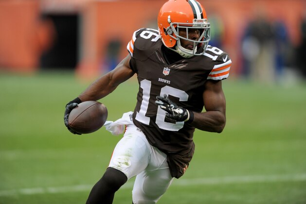 Nov 16, 2014; Cleveland, OH, USA; Cleveland Browns wide receiver Andrew Hawkins (16) scores a touchdown during the second quarter against the Houston Texans at FirstEnergy Stadium. Mandatory Credit: Ken Blaze-USA TODAY Sports