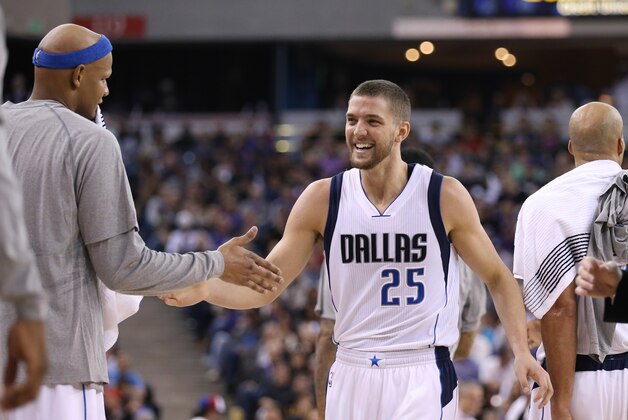 Feb 5, 2015; Sacramento, CA, USA; Dallas Mavericks forward Chandler Parsons (25) high fives forward Charlie Villanueva (3) as a timeout is called after scoring a basket against the Sacramento Kings during the second quarter at Sleep Train Arena. Mandatory Credit: Kelley L Cox-USA TODAY Sports