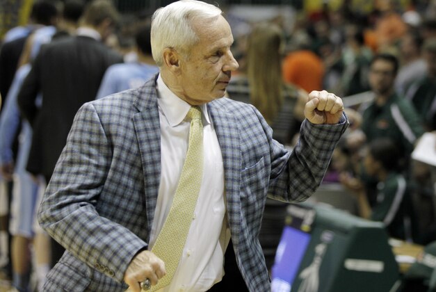 North Carolina head coach Roy Williams gestures after the Tar Heels defeated Miami 73-64 in an NCAA college basketball game, Saturday, Feb. 28, 2015, in Coral Gables, Fla. (AP Photo/Luis M. Alvarez)