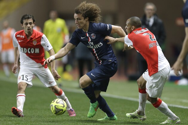 PSG's David Luiz, center challenges for the ball with Monaco's Bernardo Silva, left, and Monaco's Fabinho, during the French League One soccer match between Monaco and Paris Saint Germain, in Monaco stadium, Sunday, March 1, 2015. (AP Photo/Lionel Cironneau) PSG's David Luiz, center challenges for the ball with Monaco's Bernardo Silva, left, and Monaco's Fabinho, during the French League One soccer match between Monaco and Paris Saint Germain, in Monaco stadium, Sunday, March 1, 2015. (AP Photo/Lionel Cironneau)