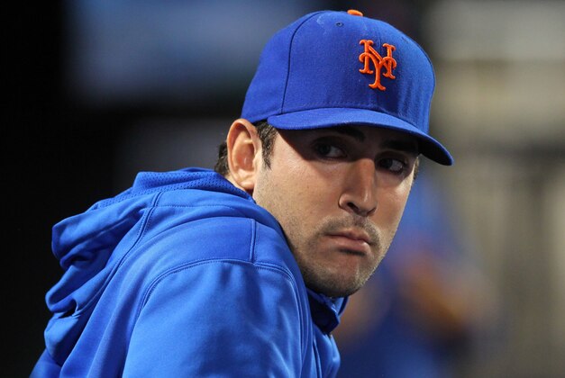 Sep 9, 2013; New York, NY, USA; New York Mets injured starting pitcher Matt Harvey (33) looks on from the dugout during the sixth inning of a game against the Washington Nationals at Citi Field. Mandatory Credit: Brad Penner-USA TODAY Sports