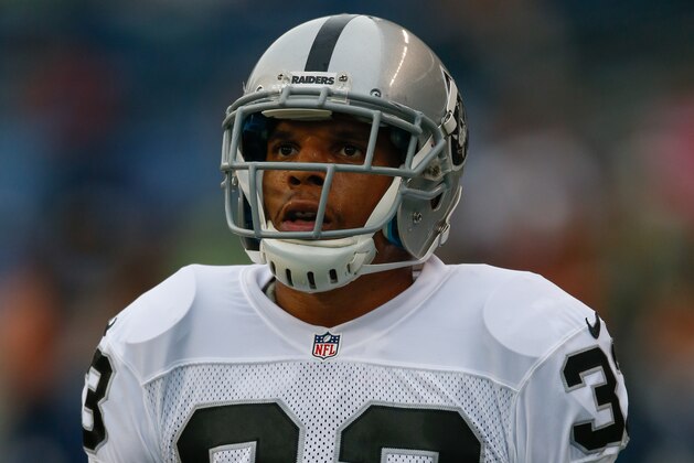 SEATTLE, WA - AUGUST 29: Safety Tyvon Branch #33 of the Oakland Raiders warms up prior to the game against the Seattle Seahawks at CenturyLink Field on August 29, 2013 in Seattle, Washington. (Photo by Otto Greule Jr/Getty Images)