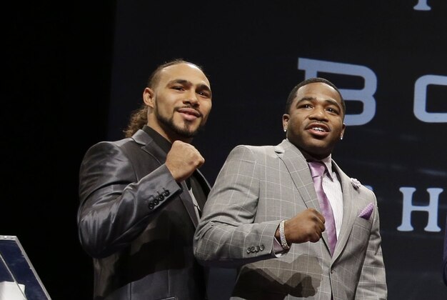Boxing legends and current fighters pose for a picture during a news conference in New York, Wednesday, Jan. 14, 2015. From left are, Keith Thurman, Adrien Broner, Danny Garcia, Thomas Hearns, Roberto Duran, Sugar Ray Leonard, Lamont Peterson, John Molina, Jr. and Robert Guerrero. NBC plans to air boxing matches on broadcast television beginning with an event on March 7, 2015. (AP Photo/Seth Wenig)